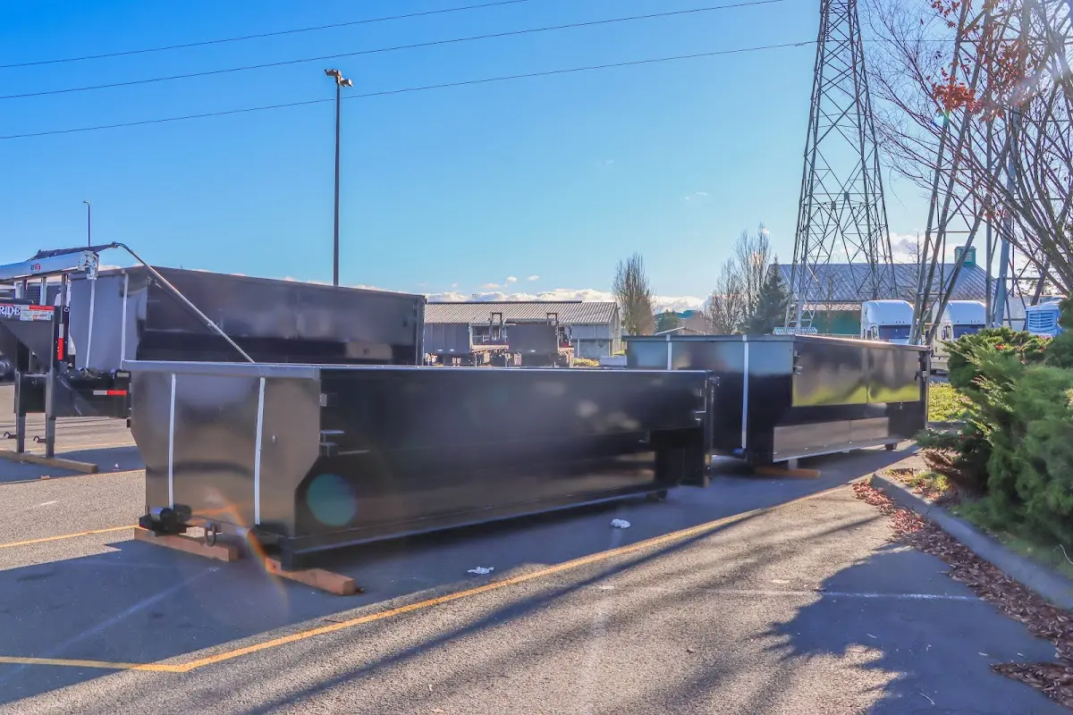 Roll-off dumpster ready for waste disposal at job site for Residential Dumpster Rental in Covington